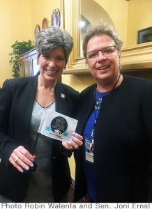 Robin Walenta of West Music Presents Award to Iowan Senators
